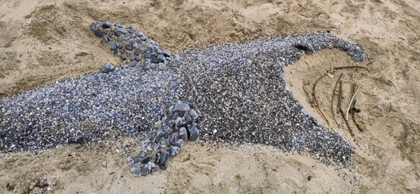 Stones on top of sand