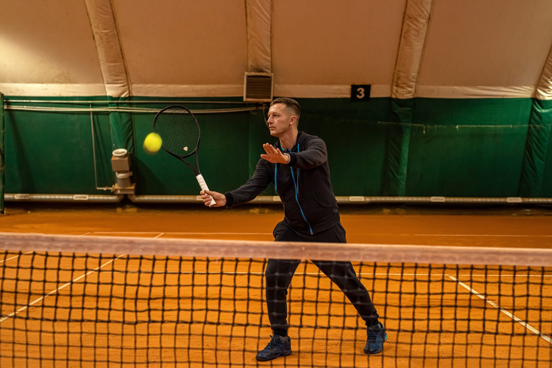 A person playing tennis.