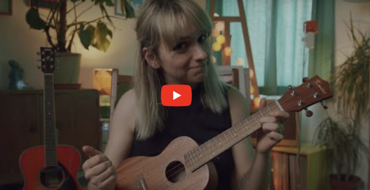 A person playing a guitar