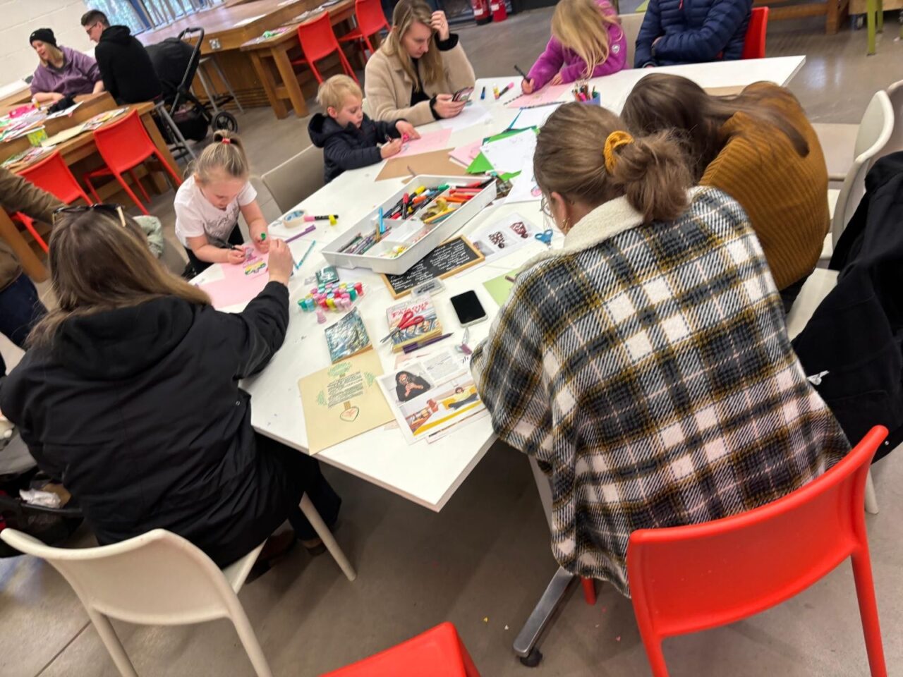 Picture of group making lovespoons